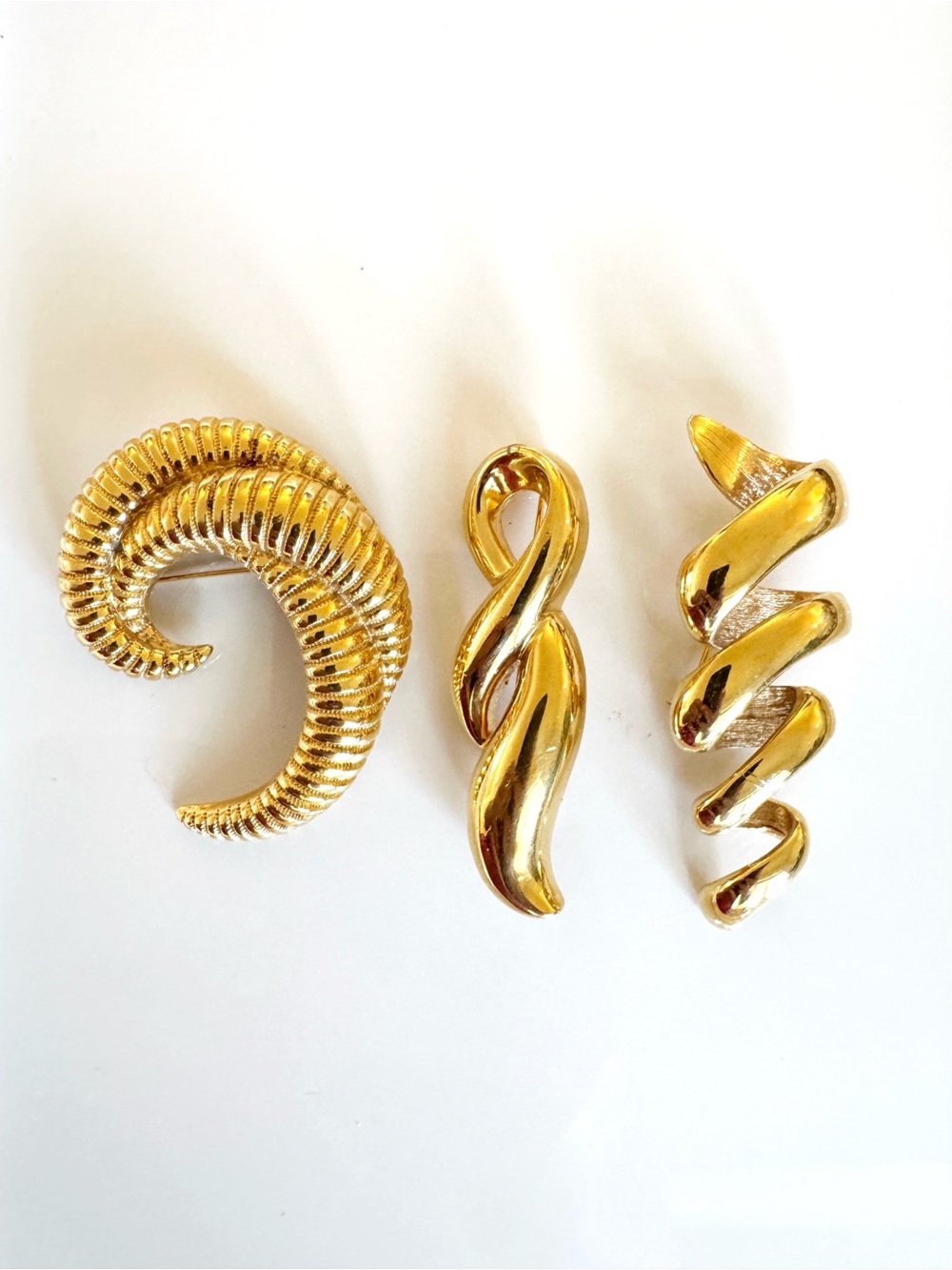 Monet Gold-Tone Spiral Brooch Trio - Sculptural Swirl Designs